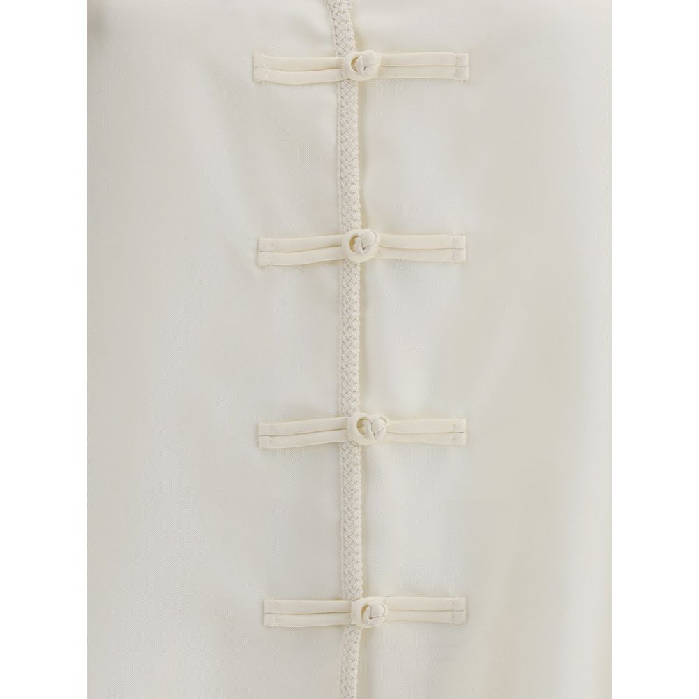 Courrèges Polo with twisted detail