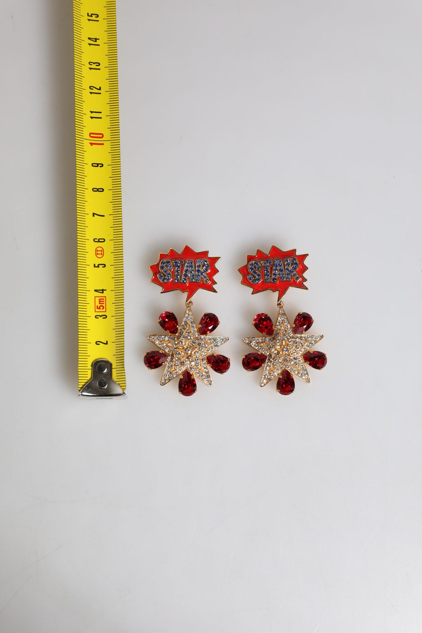 Gold Star-Shaped Sparkling Red Crystals Clip On Earrings