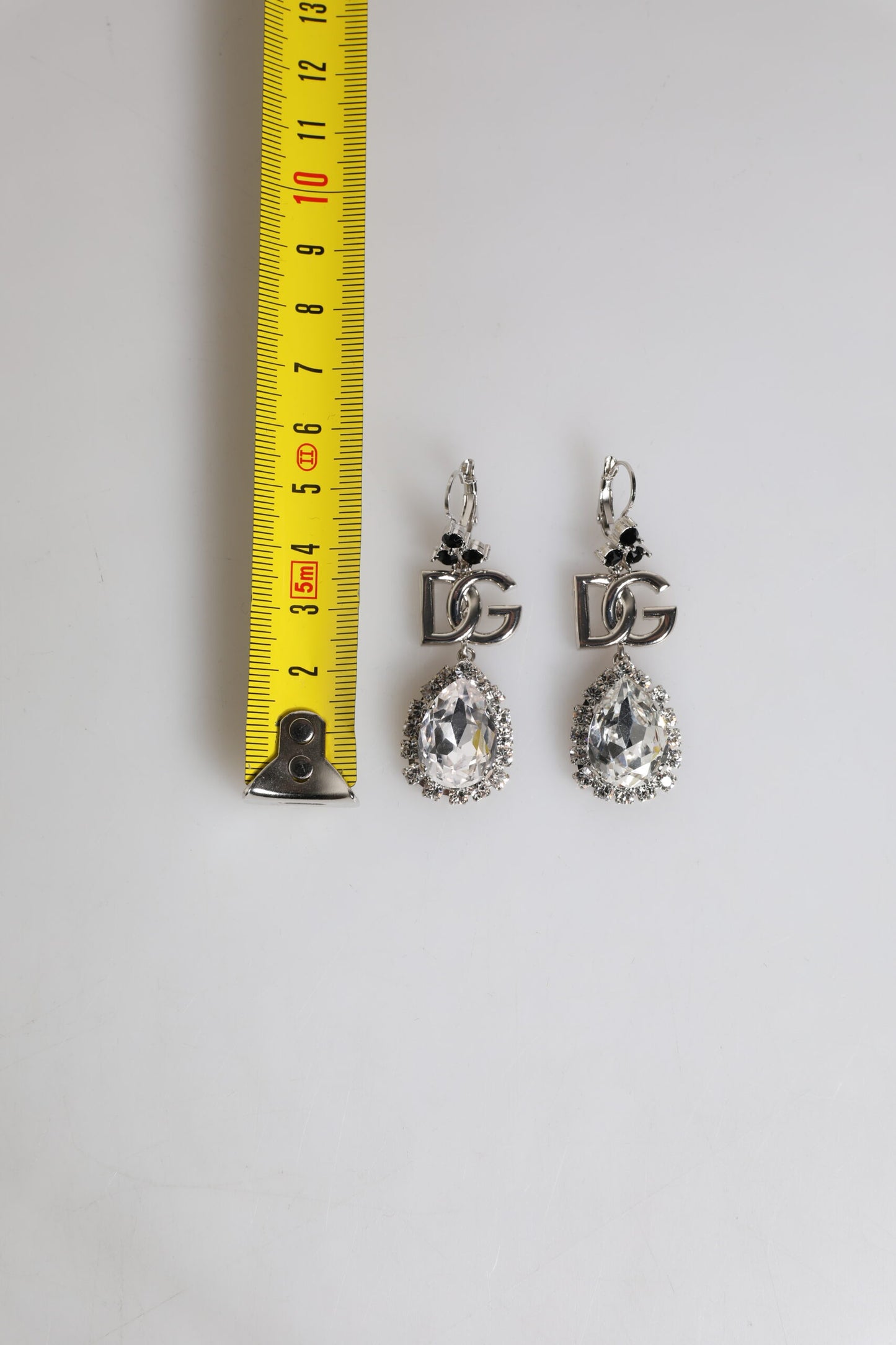 Silver Brass Crystal Teardrop DG Logo Clip On Earrings