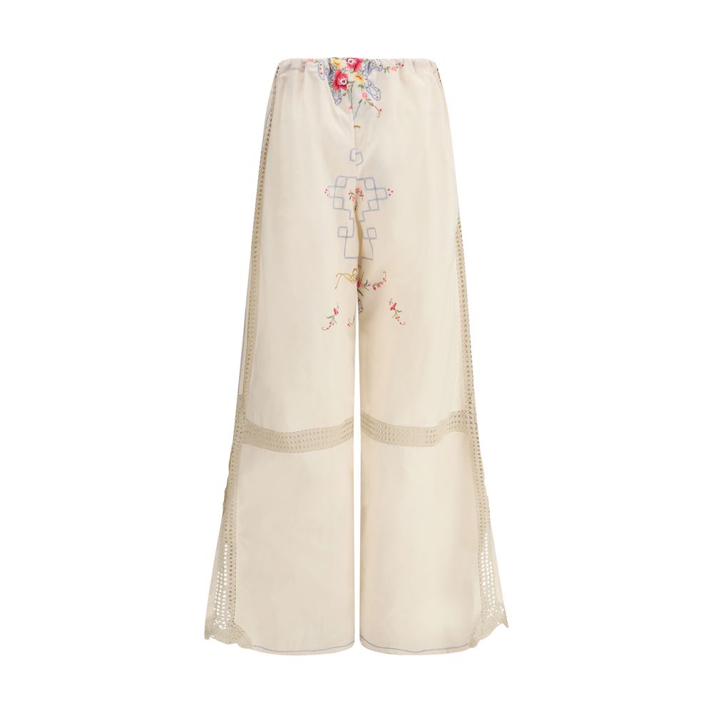 Pants with floral details