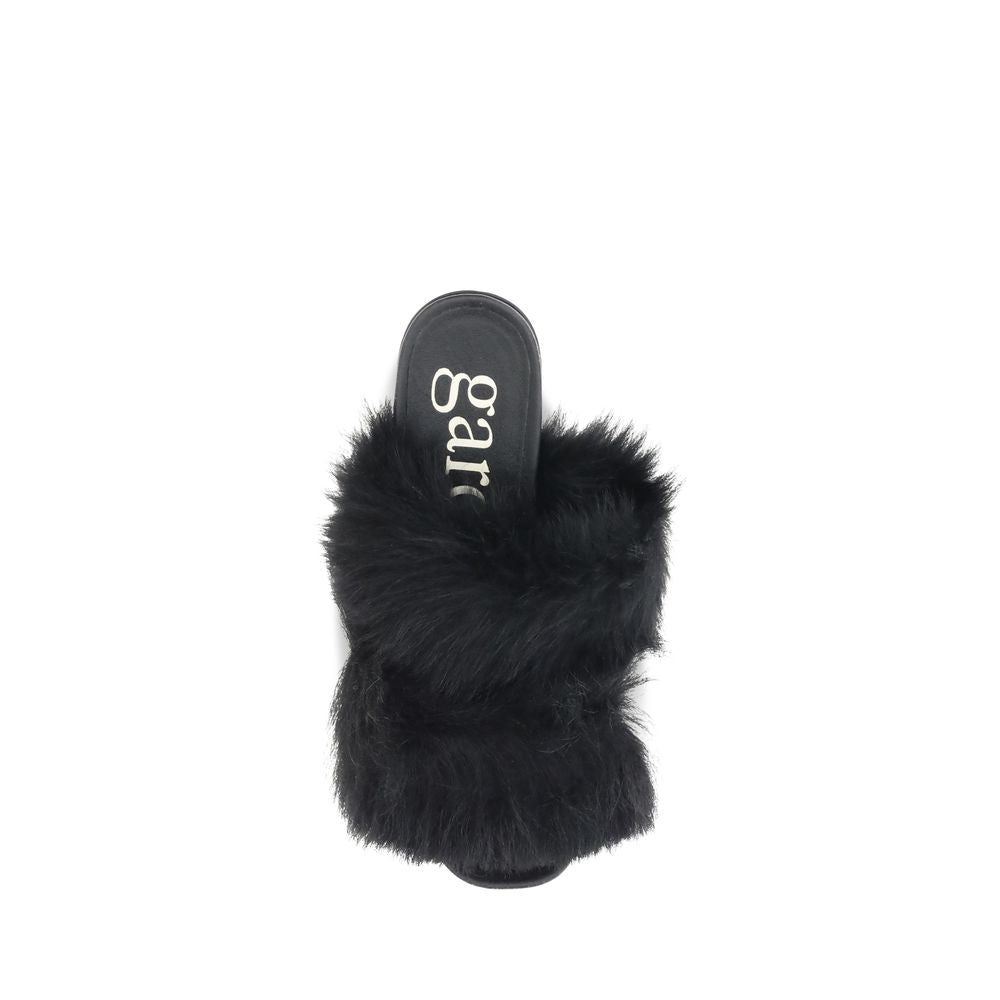 Fur-trimmed mules Sandals