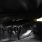 Black and gold makeup bag
