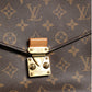 Pochette Métis Monogram