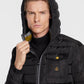 Elegant Black Hooded Down Jacket with Chic Olive Accent