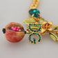 Gold Brass Crystal Logo Fruit Floral Statement Necklace