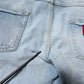 Light Blue Tattered Logo Skinny Denim Jeans