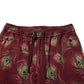 Burgundy Peacock Feather Print Jogger Pants