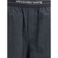 Trousers with elastic waistband and contrasting jacquard logo